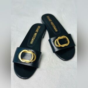 Stuart Weitzman Caicos Black Slide Sandals with Gold Accent